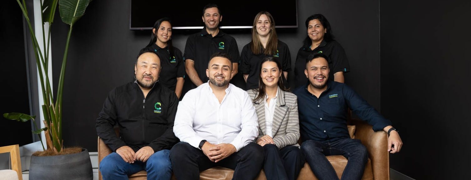 Professional cleaning service technician wearing safety equipment